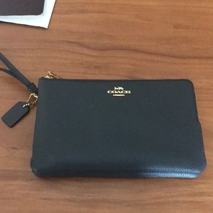 Brand new coach small clutch